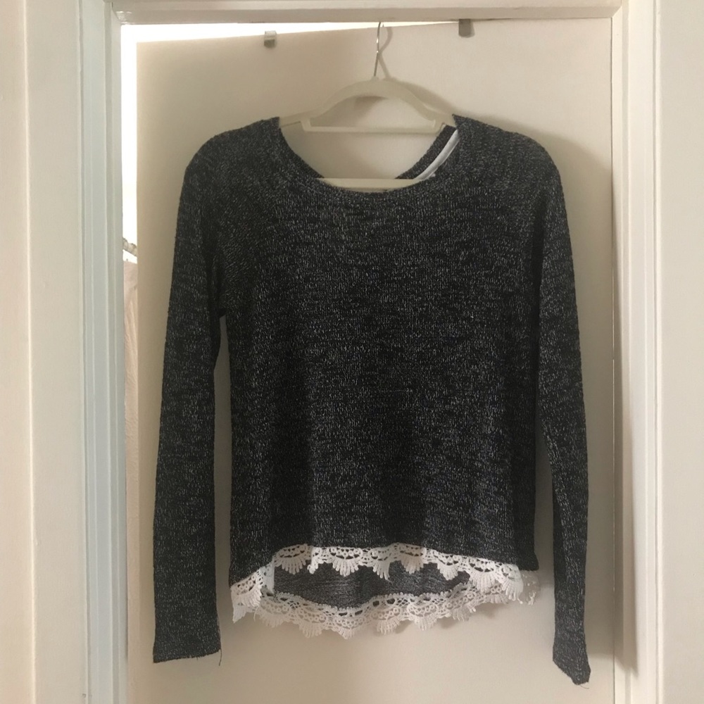 Light weight sweater with laced bottom